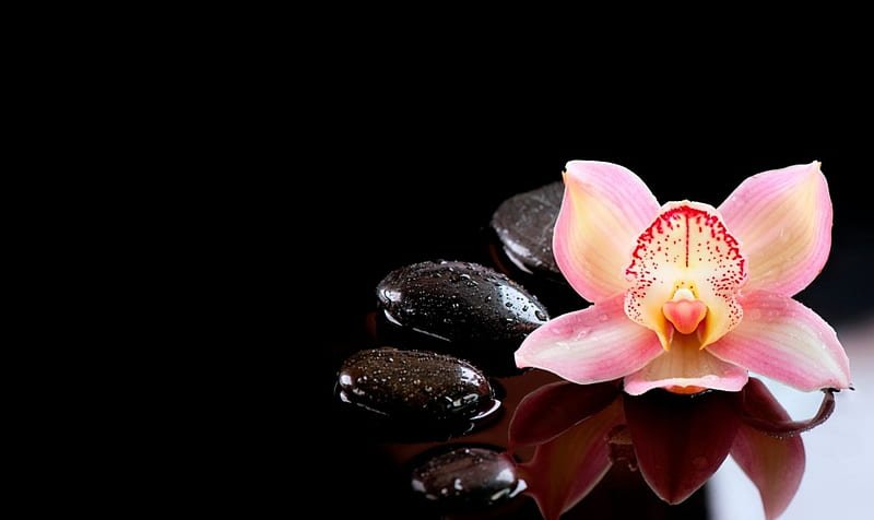 Relaxing Spa Setting with candles and towels